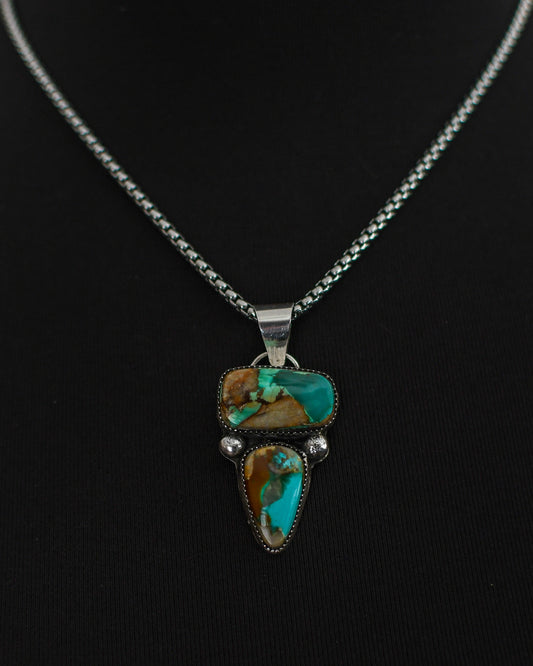 Pilot Mountain 2 stone turquoise pendant on black background
