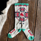 Decorative sock with floral pattern on a wooden surface