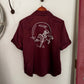 Maroon sweatshirt with a white graphic on a white surface