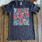 Western Rose Ranch Graphic tee on rustic wood background 