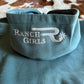 Blue hoodie with 'Ranch Girls' logo on a blurred background