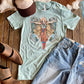 Flat lay of Cowgirl Fly Tee