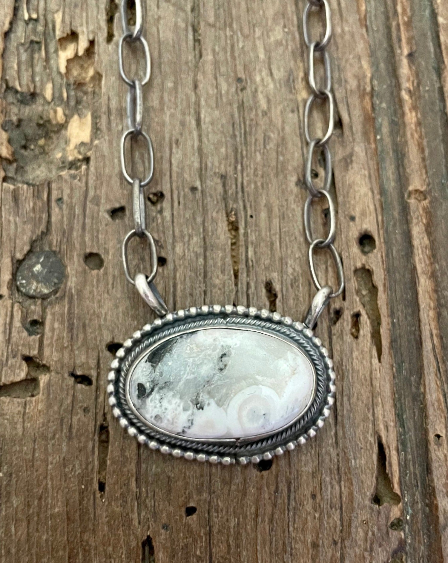 Close up shot of White Buffalo stone in necklace