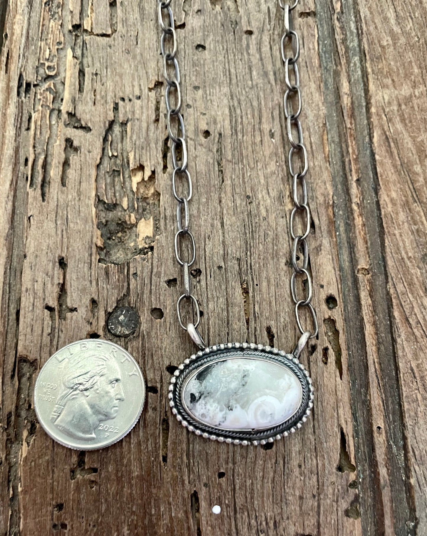White Buffalo Oval Bar Necklace with quarter for size comparison