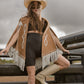 Model wearing a brown leather cape sitting on a bucking chute